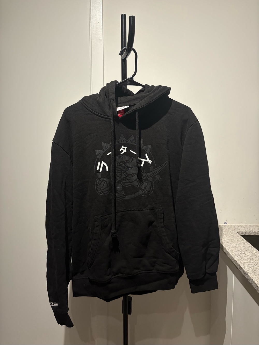 Mitchell & Ness Black Pullover Hoodie with Subtle Front Graphic